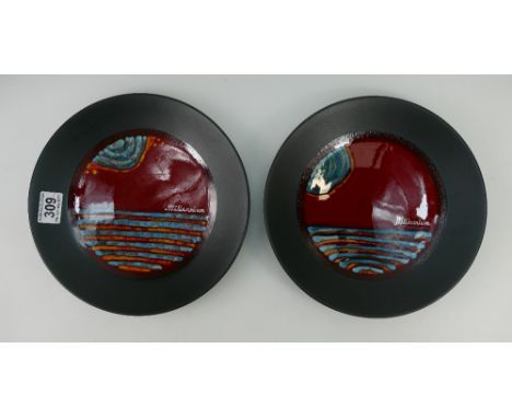 Poole pottery footed bowls/ chargers decorated in the millennium design both signed Alan Clarke 1999 (2) 27cm