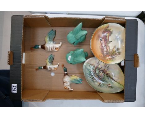 A mixed collection of items to include Royal Doulton series ware, wall plaques and green ceramic sylvac style rabbits