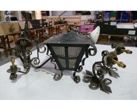 A collection of wrought iron wall lights to include large exterior lambton wall sconces and ceiling lamp. (4)