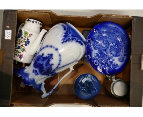 A collection of items to include Large flow blue water jug, Goebel lidded pot, navy rum decanter, Shakespearean books and his