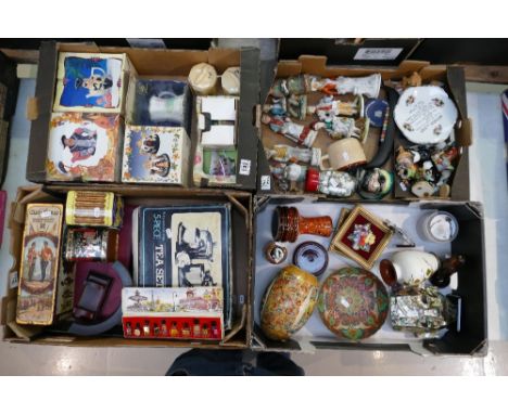 A mixed collection of items to include tin boxes, liliput lane items, novelty toby jugs, continental ceramic figures, orienta