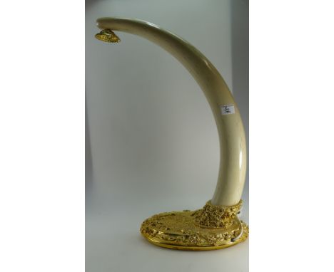 Large resin and brass gilt table lamp in the form of an elephants tusk height 65cm