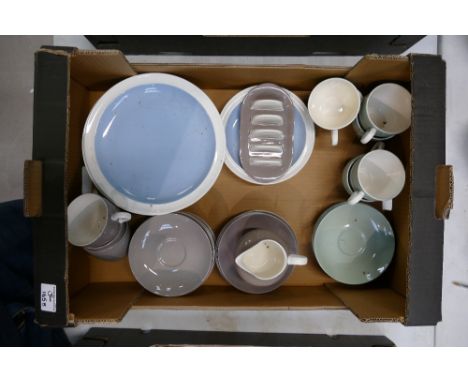 A collection of Wedgwood dinner and tea ware in different colours to include dinner plates, toast racks, cups, saucers, etc 