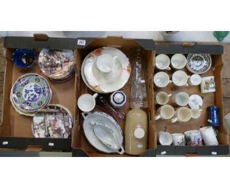 A mixed collection of items to include commemorative cups and saucers, decorative Royal Doulton wall plates, Grimwades tureen