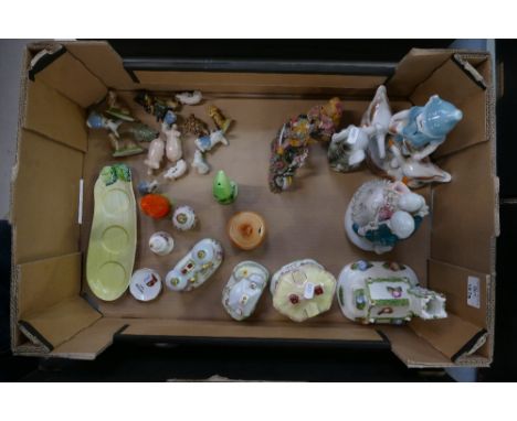 A collection of mixed ceramics to include Coalport cottages, unmarked continental ceramic figures, Wade Whimsies and Art Deco