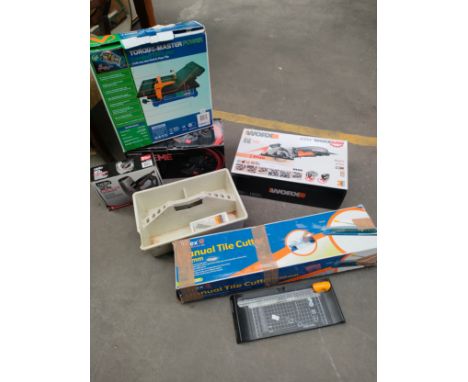 Selection of boxed power tools to include work saw, nail gun, compact tile sander etc. 