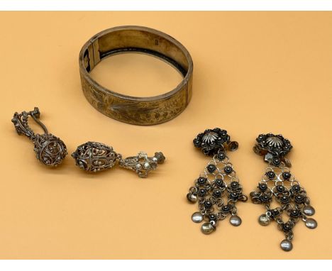 Chester silver bangle, together with a pair of 925 silver earrings and Filigree silver egg shaped earrings. [Will post] 