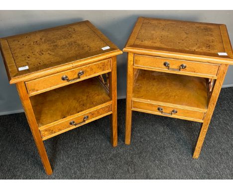 Pair of walnut bedside cabinets, the rectangular top above a single drawer and open shelf and under drawer, raised on square 