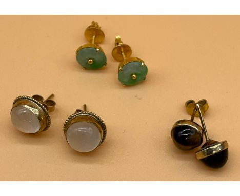 Three pair of gold earrings, Includes Opalescent and 9ct gold earrings, 9ct gold and tiger eye stone earrings and a pair of u