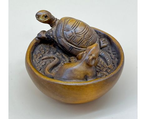 Japanese hand carved netsuke sculpture of a Turtle and Mouse within a bowl, Both with black bead eyes and signed. [4cm in dia