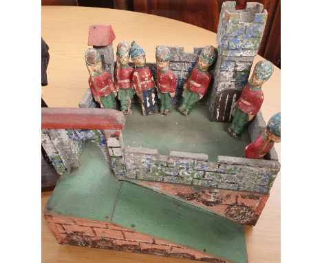 A Collection of Vintage toys to include play worn cars, puppet and a  Fort with Wooden Soldiers. 