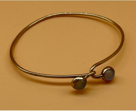 9ct yellow gold bangle set with two possible moon stones [4.41grams] [Will post] 
