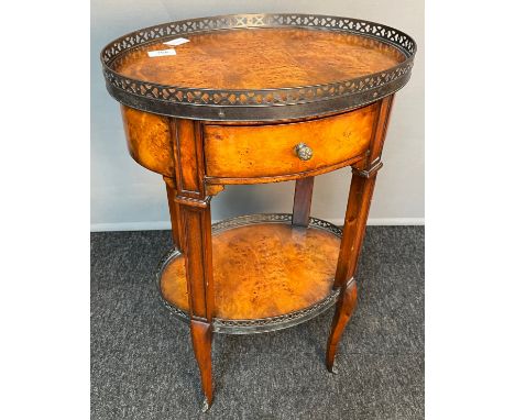 Antique style oval side table [Theodore Alexander] the top with pierced brass gallery above a single drawer and duplicate she