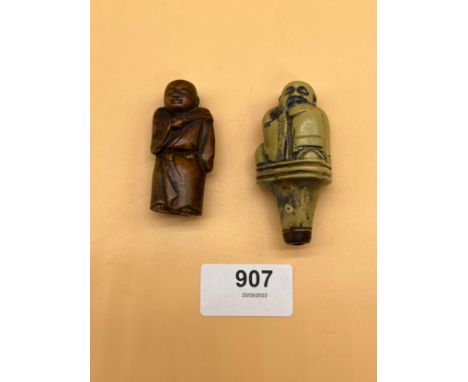 Antique Japanese Meiji period carved netsuke monk figure together with resin style figure. 