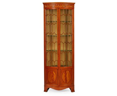EDWARDIAN SHERATON REVIVAL PAINTED SATINWOOD CORNER DISPLAY CABINETEARLY 20TH CENTURYof bowfront outline, the moulded cornice
