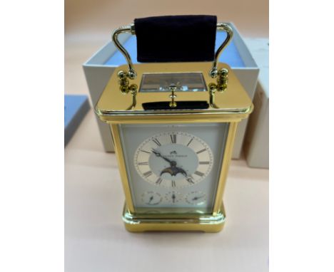 As New Matthew Norman brass carriage clock. Comes with box. 