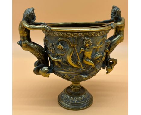 Antique gilt bronze two handle urn. Depicting to fawn figure handles, Various nude figures on sea horse and fish back, [16cm 