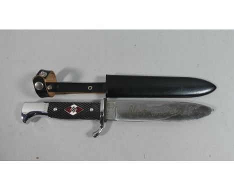 A Reproduction Nazi Hitler Youth Dagger, The Blade Inscribed Blut Und Ehre with Enamelled Swastika Device to Handle and Metal