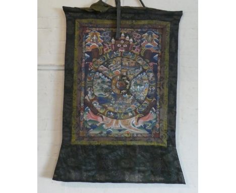 An Tibetan Wall Hanging Painted Panel with Woven Border and Surround, Depicting Heaven and Hell 100cm x 66cm
