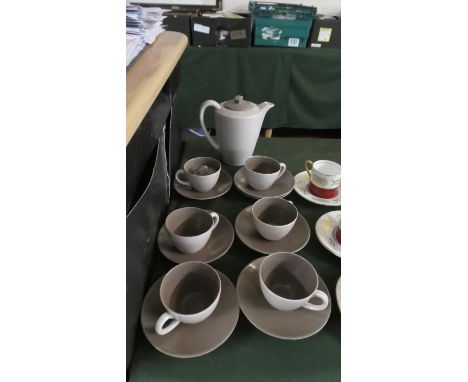 A Poole Part Coffee Set Comprising Six Cups, Seven Saucers and a Coffee Pot 