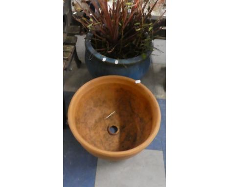 A Terracotta Circular Patio Planter and a Blue Glazed Example Containing Pot Plant 