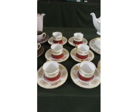 A Set of Six Aynsley Coffee Cans and Saucers 