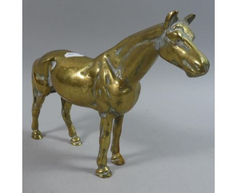 A Heavy Brass Model of a Racehorse, 26cm Long 