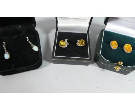 Three Pairs of Silver Mounted Earrings to Include Amber and Opal Examples 