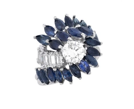 Vintage Round Brilliant and Baguette Cut Diamond, Marquise Cut Sapphire and 18 Karat White Gold Ring. Stamped 18K. Ring size 