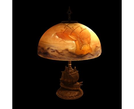 Antique Aladdin Reverse Painted Glass Nautical Lamp. The Shade reverse painted with a sailing ship motif, the base with a sai