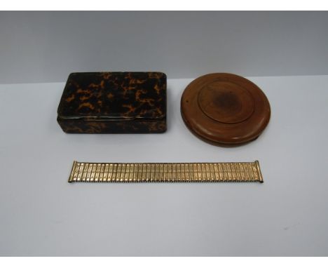 A 19th Century tortoiseshell snuff box, treen item and a watch strap (3)
