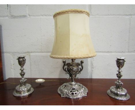 A pair of Elkington &amp; Co silver plated candlesticks with figural and floral detailing, 16cm tall and a silver plated tabl