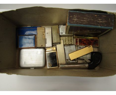 An assortment of lighters together with an engine turned and enamelled powder compact and cigarette case