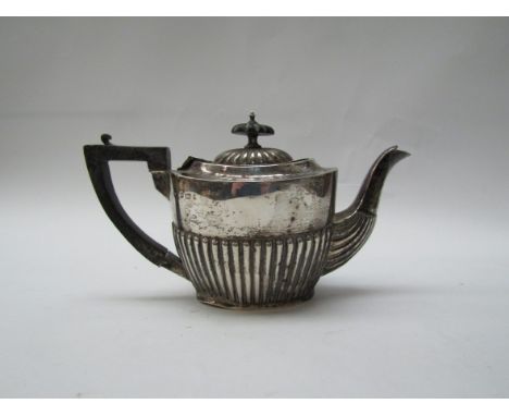 A silver bachelor's teapot, Birmingham hallmarks rubbed