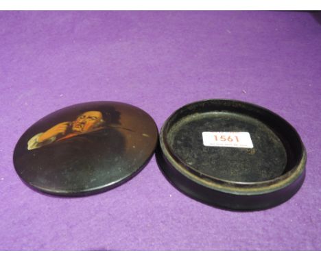 A 19th century papier mache snuff box with hand painted portrait 'An old friend with a new face'