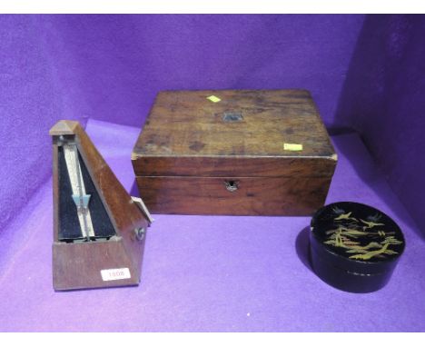 A treen jewellery box an antique metronome by Paquet and lacquer box