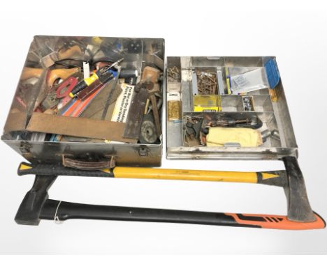 A metal chest with lift out tray of assorted tools and hard ware, together with two axes 