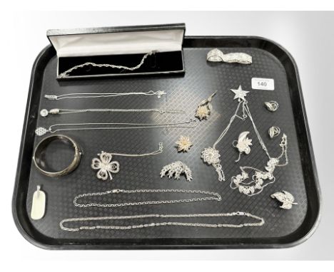 A group of silver jewellery, filigree items, chains, necklaces, engraved bangle, white metal items etc 