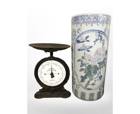 A contemporary Chinese porcelain cylindrical stick pot, height 46 cm, and a Salters postal balance scale.