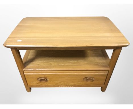 An Ercol elm low drop leaf entertainment stand, width 71 cm x 45 cm deep x 48 cm high 