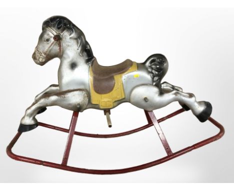 A vintage child's tin rocking horse, length 107 cm