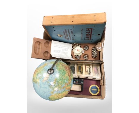 A terrestrial globe, several Lledo die cast cars, Warri game with instructions, fitbits engineering set in box etc (2 boxes)