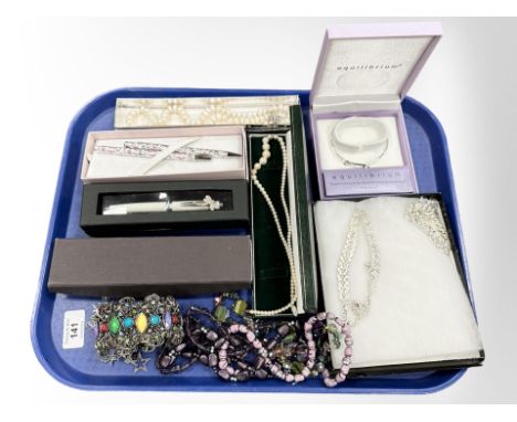 A group of costume jewellery, pens, necklaces, bangle etc 