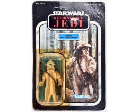 A Kenner Star Wars Return of the Jedi Logray (Ewok Medicine Man) vintage 3.75" figure. On a sealed 1983 unpunched 65 back car
