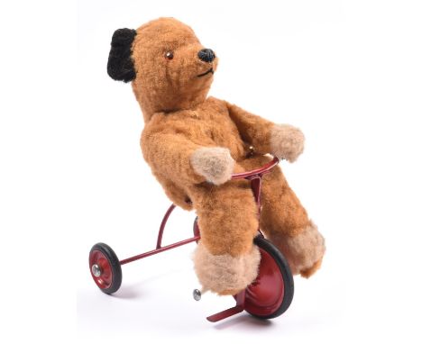 A scarce Chiltern 'Bear on a Tricycle' designed by Pamela Howells in 1958. (CB1-0669). A small straw filled fur covered bear 