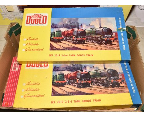 2 Hornby-Dublo 2-rail electric Train Sets. Both are Set 2019 2-6-4 Tank Goods Train. Comprising BR class 4MT 2-6-4T locomotiv