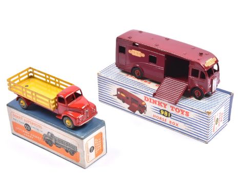 2 Dinky Toys. A Leyland Comet Lorry (531). Example with bright red cab and chassis, with yellow rear body and wheels, fitted 