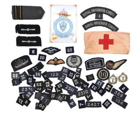 A quantity of R Observer Corps cloth insignia,  including shoulder title (2), and approx 60 associated unit numerals, 2 WM ca