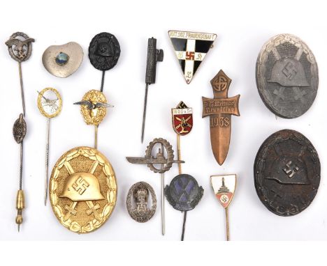 3 Third Reich wound badges: gold with solid back marked ‘L/63’, grey metal (silver) with solid back, marked ‘L/11’, and die s