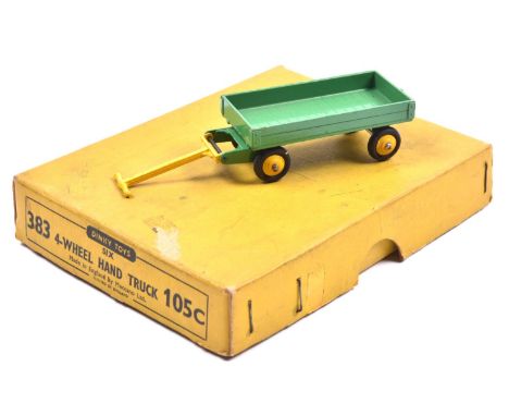 A scarce Dinky Toys Trade Pack for 'Six 4-Wheel Hand Truck 383 105C'. Containing 6 examples, in mid green with bright yellow 